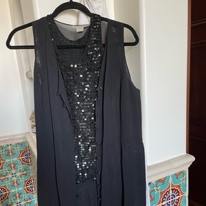 Black vest, wide sheer pants